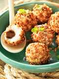 Trufas de queso con relleno de Olivada