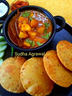बेड़मी पूड़ी और आलू की सब्जी (bedmi puri aloo ki sabzi recipe in hindi) रेसिपी मुख्य फोटो
