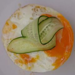 A picture of Eggs With Onion And Cheese Burger.