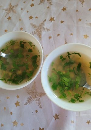 A picture of Crystal clear sweet corn soup.