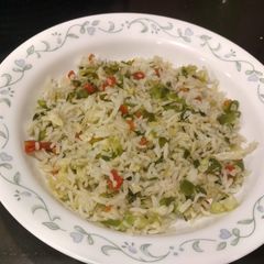 A picture of Rice with veggies.