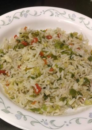 A picture of Rice with veggies.