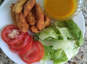 Una foto de Dedos de pollo en salsa de mango y habanero