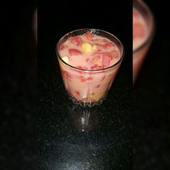 A picture of Fruit salad with milk.