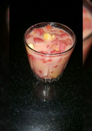 A picture of Fruit salad with milk.
