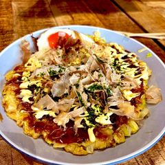 A picture of Okonomiyaki (Japanese Savory Pancake).