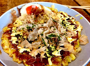 A picture of Okonomiyaki (Japanese Savory Pancake).