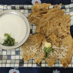 A picture of Cheese butter pav bhaji paratha.