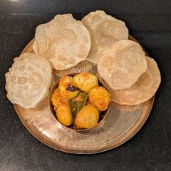 A picture of Phulko Luchi and Aloor Dom.