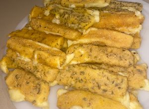 Una foto de Bastones de muzzarella