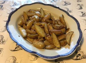 Une photo de Pommes de terre sautées au saindoux et romarin