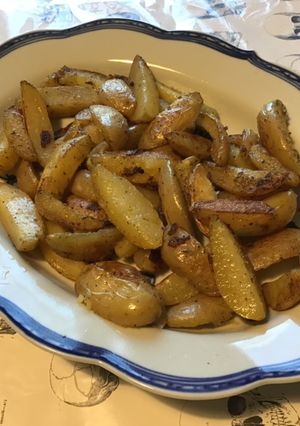 Une photo de Pommes de terre sautées au saindoux et romarin