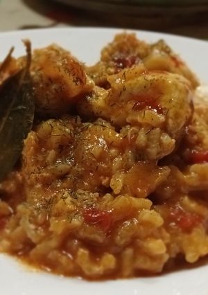 Una foto de Arroz con tintorera