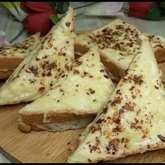A picture of 3 Spice melted cheese sandwich.
