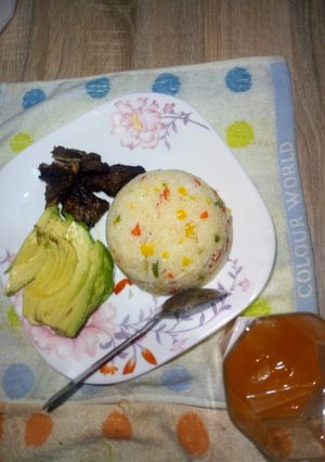 A picture of Fried rice,ovacado and baked beef.