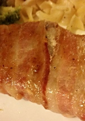 A picture of Brown sugar bacon wrapped pork chops.