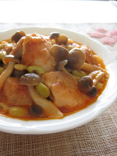 A picture of Chicken and Shimeji Mushrooms Simmered In Tomato and Yogurt Sauce.