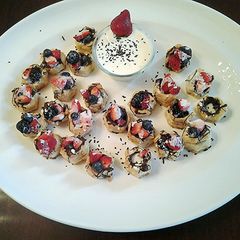 A picture of Creme Anglaise fruit tarts.