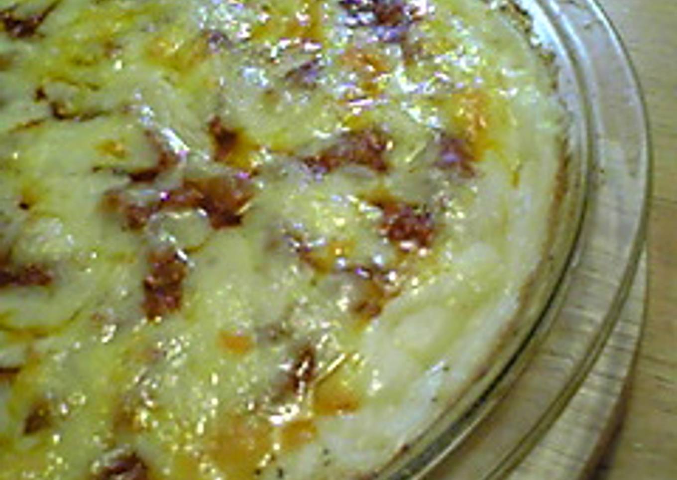 Creamy baked potatoes with sauce