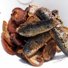 A picture of Pan Fried Mushroom And Sardine.