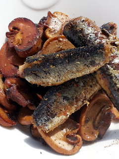 A picture of Pan Fried Mushroom And Sardine.