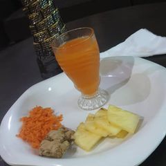 A picture of Carrot and pineapple juice.