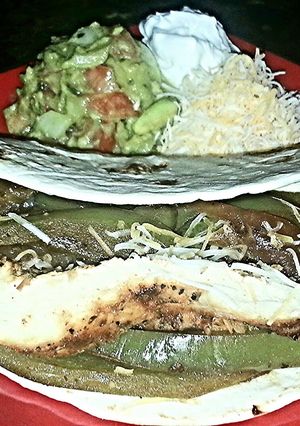 A picture of Mike's Garlic Lime Chicken Fajitas.
