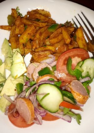 A picture of Chips masala and kachumbari.