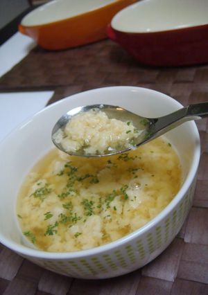 A picture of Roma-style Consomme Soup with Cheese.