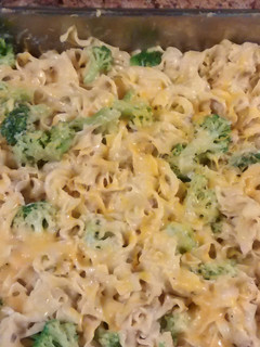 A picture of Tuna casserole, with broccoli.