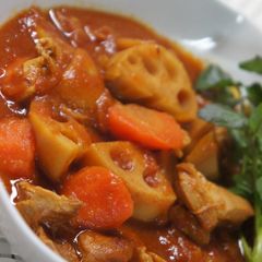 A picture of Tomato and Curry Stew with Chicken and Lotus Root.