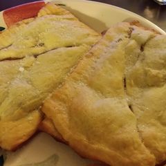 A picture of Homemade Apple pies.