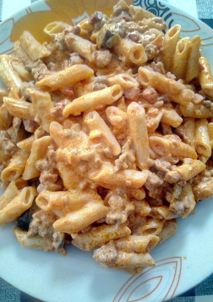 Una foto de Macarrones tomate y nata