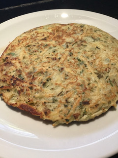 Una foto de Tortilla de papa rallada