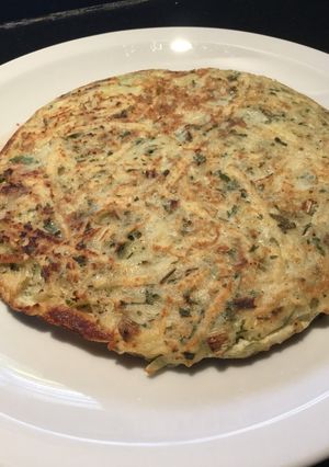 Una foto de Tortilla de papa rallada