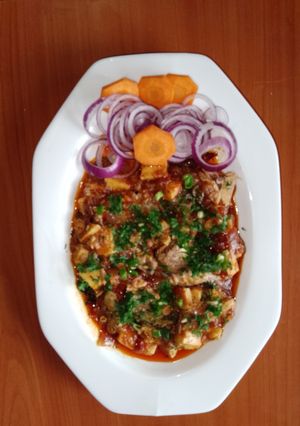 A picture of Sardines in 🍅 tomato sauce.