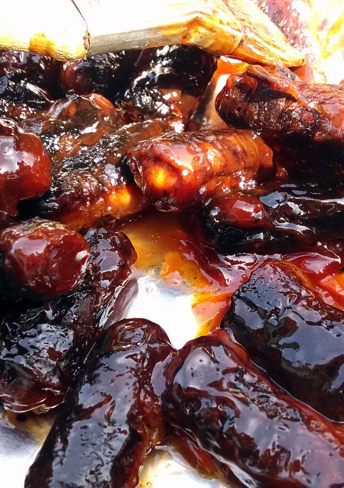A picture of Bacon Wrapped Weenies.