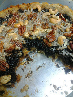 A picture of Dark Chocolate nut tart.