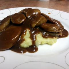 A picture of Bangers and Garlic Onion Mash.
