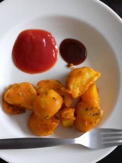 A picture of Viazi Karai with Dhania and seasonings.