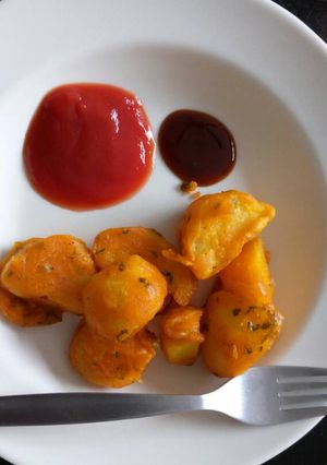 A picture of Viazi Karai with Dhania and seasonings.