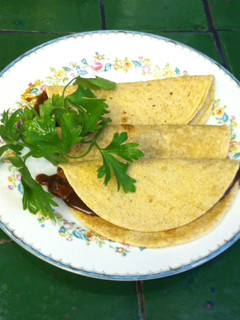 Una foto de Tacos de champignons en mole