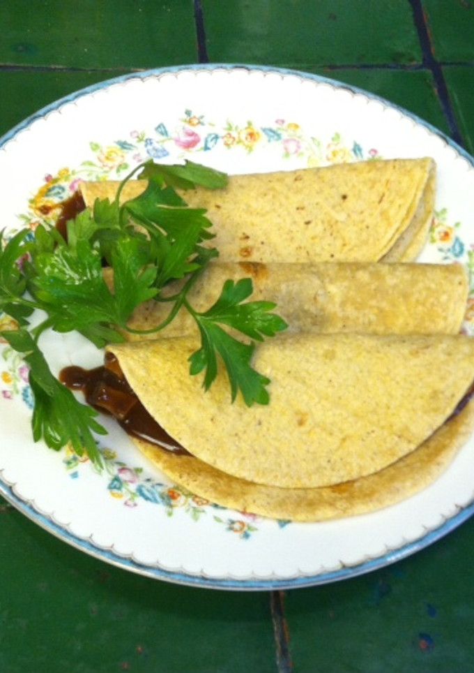 Una foto de Tacos de champignons en mole