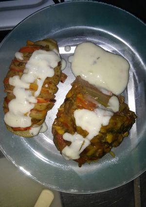 Una foto de Papas y lomo hasselback