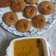 A picture of Daal and pan fried bafla.