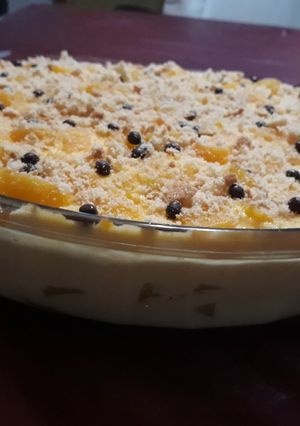 Una foto de Postre con vainillas y durazno!!