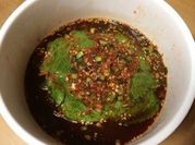 A picture of red chilli powder sesame seeds