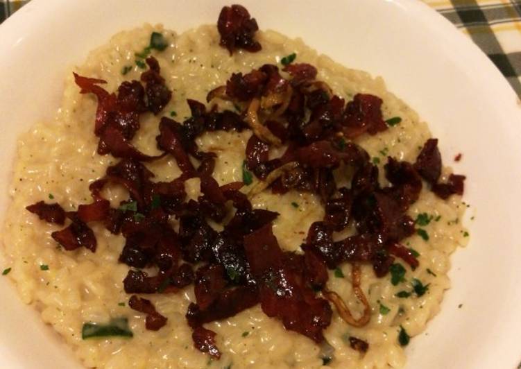 Risotto cremoso prosciutto crudo croccante e zucchine