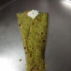Palak paneer roll A picture of Palak paneer roll.