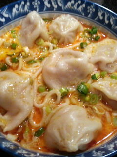 A picture of Asian Curry Noodle Dumpling Soup.